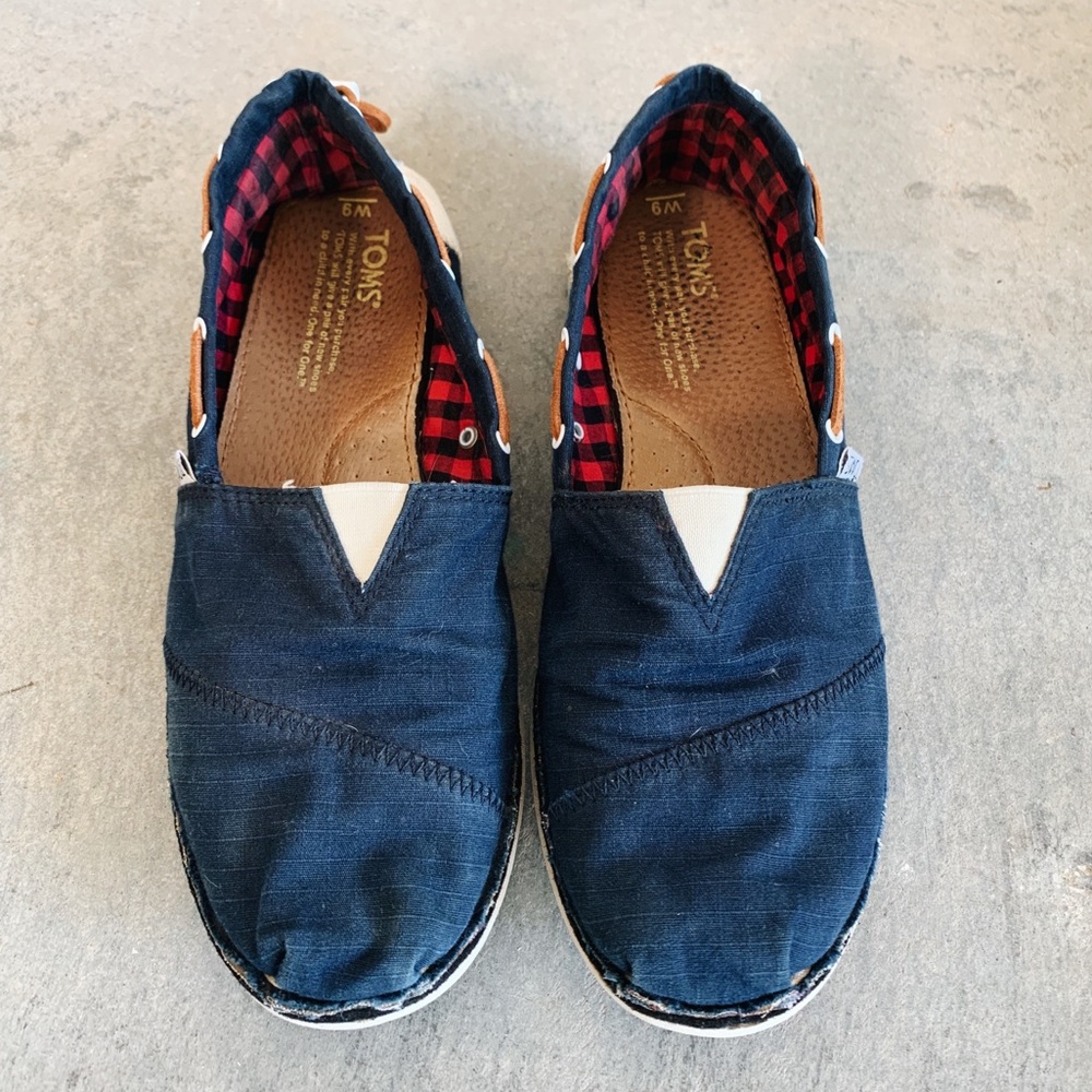 Blue TOMS with leather drawstring